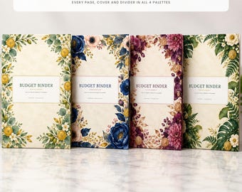 May include: Four budget binders with floral covers in green, blue, purple, and fern palettes. Each binder features a central white label with the text BUDGET BINDER and THE ULTIMATE BUDGET PLANNER. The top text reads 4 COLOR THEMES.