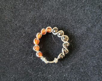 Anillo de plata con granate hessonita y espinela