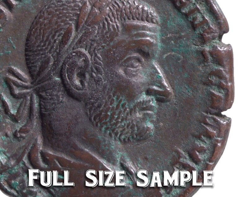 May include: Close-up of a bronze Roman coin with a profile of a man with a beard and a laurel wreath on his head. The coin has a worn surface and a green patina.