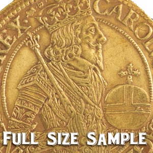May include: A gold coin with a portrait of a king wearing a crown and armor. The inscription around the edge reads "CAROLVS D G REX".