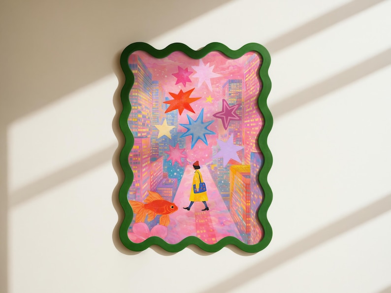 May include: A framed art print with a whimsical illustration. The artwork features a person walking through a city scene with colorful stars and a goldfish. The frame is green with a wavy edge, adding a playful touch to the piece.