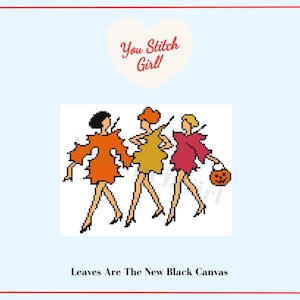 May include: A cross-stitch pattern featuring three figures in orange, yellow, and pink dresses, with one holding a jack-o'-lantern bucket. Above is a heart with the text You Stitch Girl! and below is the text Leaves Are The New Black Canvas.
