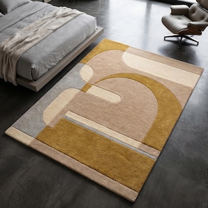 Tappeto in stile Mid-Century Modern, tappeto astratto geometrico a blocchi di colore, tappeto in lana trapuntato a mano nei toni del giallo senape e del beige.