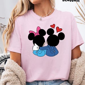 May include: A set of three ceramic nesting bowls in shades of blue, green, and white. The bowls feature a speckled glaze and a simple, modern design. The largest bowl is approximately 6 inches in diameter.