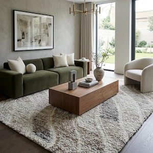 Hand tufted Modern wool, fur beige high low loop pile rug.
