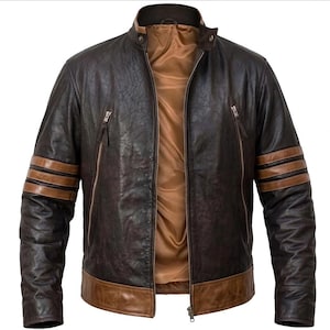 May include: A brown leather jacket with a stand-up collar and a front zipper. The jacket features brown stripes on the sleeves and a brown bottom hem. The interior lining is a light brown color.