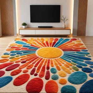 A large tufted area rug with a retro sunburst design featuring a central yellow circle surrounded by radiating colorful rays and dots in shades of blue, red, orange, and green, displayed on a wooden floor in a living room.