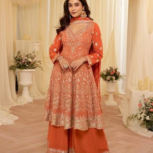 orange mehndi dress Angrakha Style Frock For Mehndi Orange Bridal Lehenga And Angrakha Frock Mehndi Dress