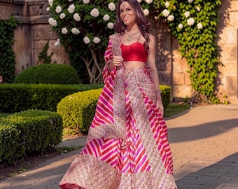 Pink designer lehenga choli with heavy sequin embroidery work, striped pink pattern, embellished borders and matching dupatta