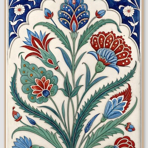 May include: A rectangular ceramic tile featuring a symmetrical floral pattern with a central blue and red tulip-like flower, surrounded by smaller red and blue blossoms, green serrated leaves, and white daisies against a cream background.