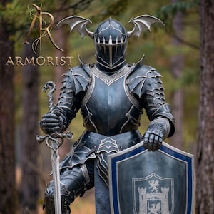 May include: A full suit of dark gray armor with dragon wing accents on the helmet. The armor includes a shield with a castle emblem and a sword. The word "ARMORIST" is visible in the image.