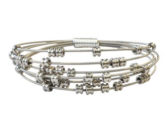 Pulseira de corda de guitarra antiestresse