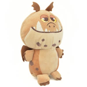 May include: A plush toy dragon in shades of brown and tan. The dragon has large, white teeth, small wings, and a friendly expression. The toy is designed with soft, textured fabric and is suitable for children.