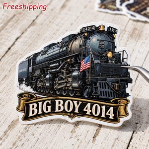 May include: A die-cut sticker featuring the Union Pacific Big Boy 4014 steam locomotive in black and metallic tones. The train displays the number 4014, a small American flag, and a banner at the bottom with the text BIG BOY 4014 in white letters.
