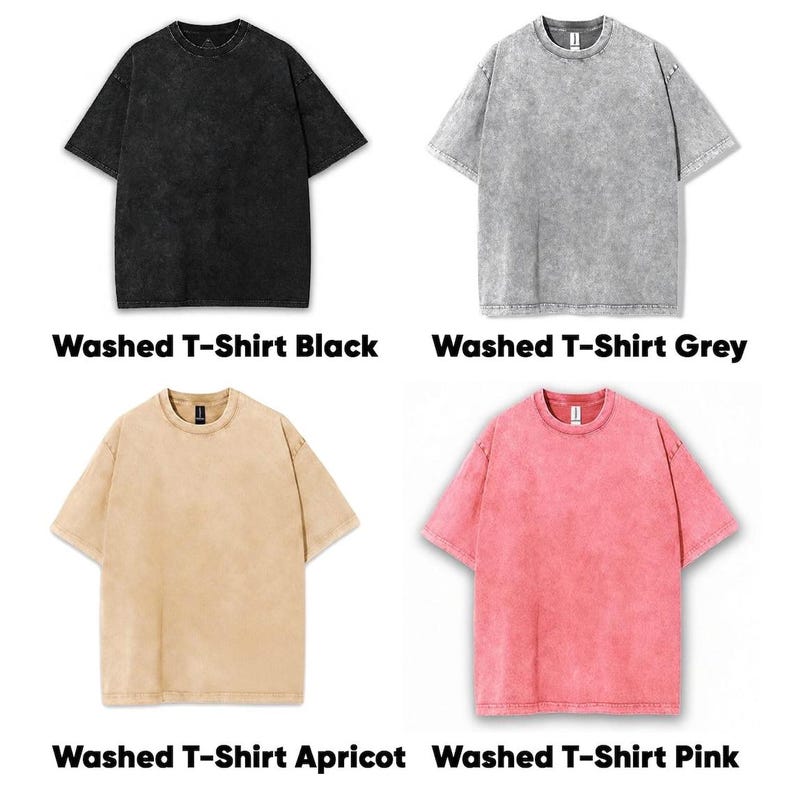 May include: Four short-sleeved, washed t-shirts in black, grey, apricot, and pink. Each shirt has a crew neck and a textured, faded appearance. The text "Washed T-Shirt" is displayed below each shirt, followed by its colour.
