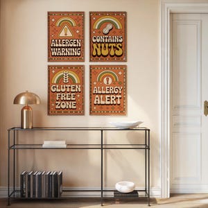 May include: Four framed retro-style posters with allergy warnings. The posters are in shades of orange, brown, and yellow, with rainbow and star designs. Text includes "Allergen Warning," "Contains Nuts," "Gluten Free Zone," and "Allergy Alert."