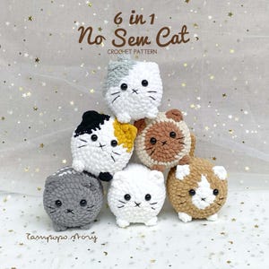 May include: A pyramid of six crocheted cat toys in various colors, including white, gray, brown, and black. Each cat has a stitched face with black eyes and whiskers. The text "6 in 1 No Sem Cat" and "CROCHET PATTERN" is visible.