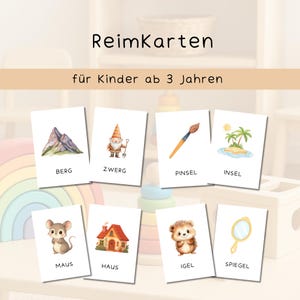 Könnte beinhalten: Ein Set aus acht weißen, rechteckigen Lernkarten mit der Aufschrift ReimKarten für Kinder ab 3 Jahren. Jede Karte zeigt eine Aquarellillustration und das entsprechende deutsche Wort: Berg, Zwerg, Pinsel, Insel, Maus, Haus, Igel und Spiegel.