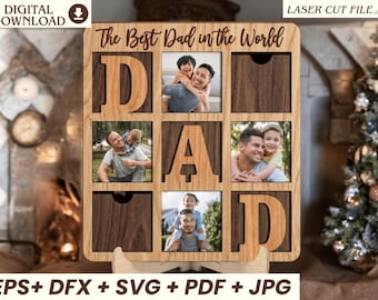May include: A square wooden photo frame with a grid design featuring the text The Best Dad in the World at the top. The frame includes cutouts for three photographs and large wooden letters spelling DAD, with dark wood panels and light wood accents.