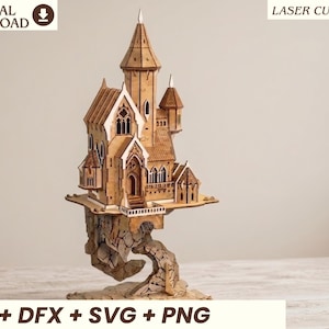 May include: A laser-cut wooden model of a castle perched on a floating rock formation. The structure features intricate architectural details, including pointed roofs, arched windows, and a balcony. Text includes DIGITAL DOWNLOAD, LASER CUT FILE, and EPS+ DFX + SVG + PNG.