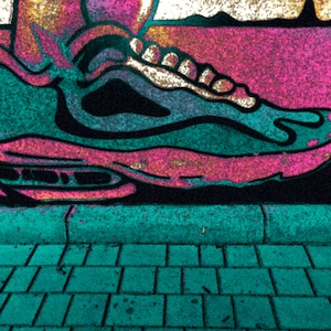 May include: A colorful illustration of a sneaker in shades of teal, pink, and black. The shoe is depicted in profile, with a detailed outline and a textured appearance. The background features a gradient of pink and gold, with a teal brick pattern at the bottom.