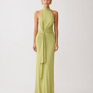 maxi dress with knot at bottom How To Knot your Maxi Dress! , , , #howtowear #howtowearit #femalefashion  #maxidress #waystowear #howto #howtotie #fyp #neutrals #neutralstyle  #endofsummer #dress | Grace and Lace