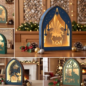 Puede incluir: Una colección de cajas de sombra de madera cortadas con láser en forma de arco que presentan escenas navideñas iluminadas. Cada pieza muestra siluetas intrincadas de belenes, paisajes invernales y figuras festivas con luz.