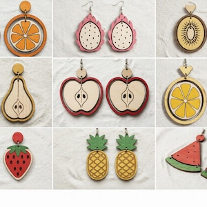 May include: A collection of wooden fruit earrings, including oranges, dragon fruit, kiwi, pears, apples, lemons, strawberries, pineapples, and watermelon slices. Each pair features a unique design and color scheme, perfect for a summer look.