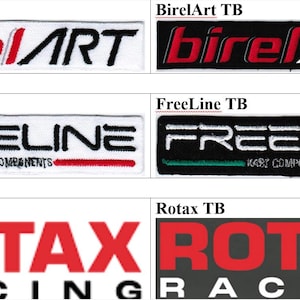 May include: A collection of six rectangular embroidered patches featuring brand logos. The top row shows BirelART in red and black on white and black backgrounds. The middle row displays FREELINE KART COMPONENTS with green and red accents. The bottom row shows ROTAX RACING in red and white on white and dark grey backgrounds.