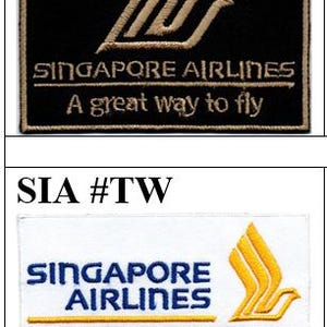 May include: Three rectangular embroidered patches featuring the Singapore Airlines logo. The first is black with gold embroidery, the second is white with blue and gold, and the third is blue with white and gold. Each includes the airline name.