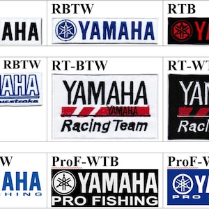 May include: A collection of rectangular embroidered patches featuring various Yamaha logos and text designs. The patches display combinations of red, white, blue, and black thread, including Yamaha Racing, Four Stroke, and YPVS Power Valve labels.