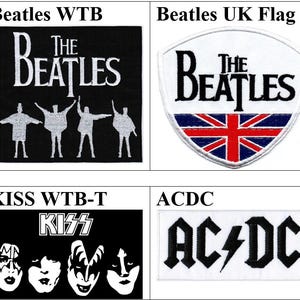 May include: A collection of eight rectangular and shield-shaped embroidered patches featuring band logos and imagery. The designs include The Beatles, KISS, AC/DC, and Bon Jovi, displayed in black, white, and red, with text labels above each patch.