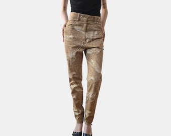 Pantalones ajustados de talle alto con estampado de leopardo y guepardo de Kenzo, raros, de los años 90.