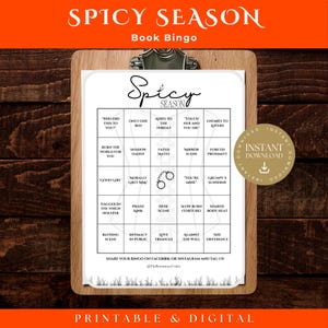 May include: A printable and digital "Spicy Season Book Bingo" game on a wooden clipboard. The bingo card features various themed prompts like "Knife to the Throat" and "Enemies to Lovers". The top text reads "Spicy Season Book Bingo".