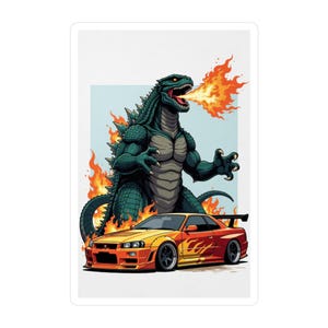 May include: A sticker featuring a green Godzilla-like monster breathing fire over a yellow and orange sports car. The monster has sharp dorsal fins and a menacing expression. The car has a spoiler and black wheels.