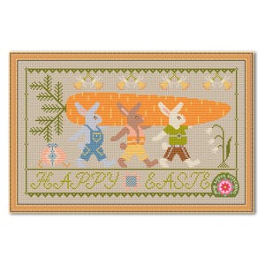 May include: Cross-stitch design featuring three bunnies carrying a large orange carrot. The bunnies wear overalls and shirts in blue, yellow, and green. The words "HAPPY EASTER" are stitched below, with a floral border.