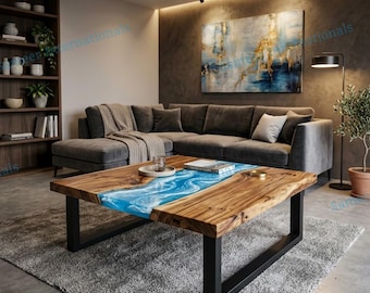 May include: A square coffee table featuring a natural live-edge wood slab with a central blue resin river inlay, supported by a black metal U-shaped frame. The table surface holds a small glass and a book, showcasing a distinct wood grain pattern.