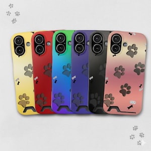 May include: A collection of colorful phone cases with a paw print design. The cases are in shades of yellow, red, green, blue, purple, black, and pink. Each case has a camera cutout and a paw print pattern. The cases also have a small bone and dog bowl graphic.