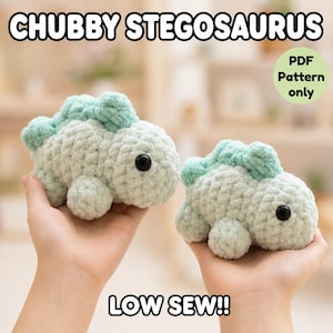 May include: Two crocheted plush stegosaurus toys in light mint green with darker green dorsal plates and black plastic eyes. The text CHUBBY STEGOSAURUS, LOW SEW!!, and PDF Pattern only are visible on the image, indicating a digital pattern.
