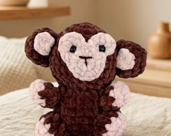 Schema per realizzare una scimmietta amigurumi all'uncinetto per principianti, un peluche (schema in PDF)