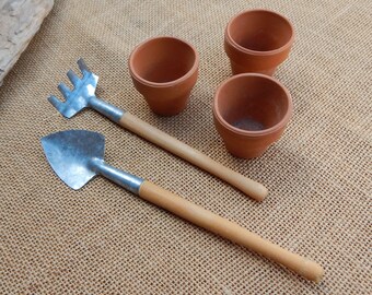 3 Mini Terra Cotta Pots & Small Wood Handle Gardening Tools  /  1 3/4" Tall x 1 3/4" Across Terra Cotta Mini Pots  /  8" Shovel  6 1/4" Rake