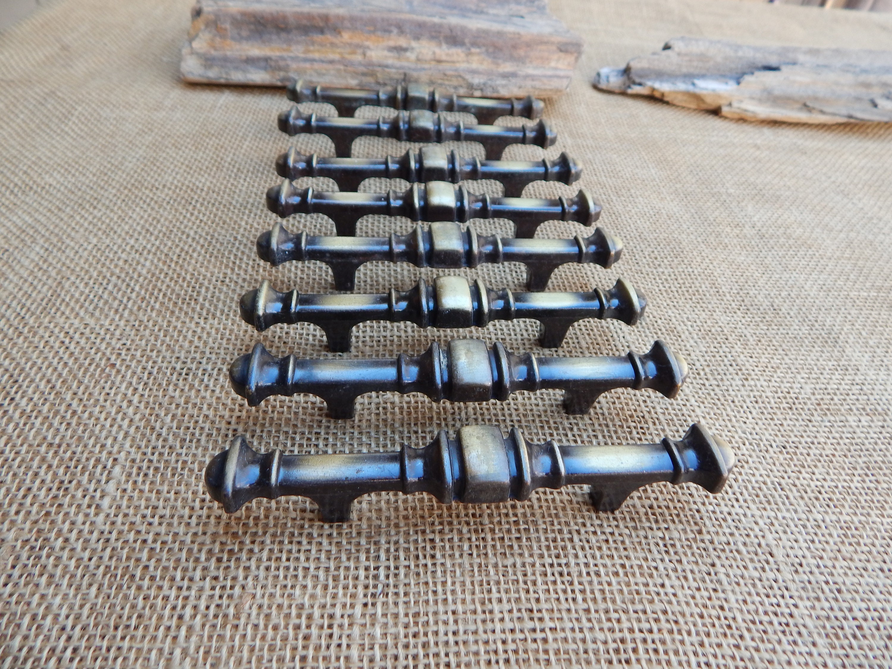 8 Amerock Antique Brass Finish Pulls  ~  8 Reclaimed Amerock Antique Brass Finish Pulls  ~  8 Salvaged Pulls  ~  Dated 1975  ~  5 1/2" Long