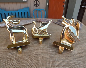3 Vintage Gold Finished Metal Stocking Holders  ~  Set of 3 Stocking Holders  ~  Reindeer Angel and Sleigh Gold Finished Stocking Holders