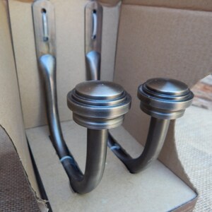 Allen + Roth Curtain Holdbacks  ~  Brushed Pewter Finish with Round Layered Finials  ~  New and Unused   ~  Model #0774454