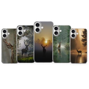 May include: Five phone cases arranged in a row, each featuring a different photographic print of a deer in a natural setting. The designs include close-ups, silhouettes against a sunset, and deer standing in misty forests or near water.