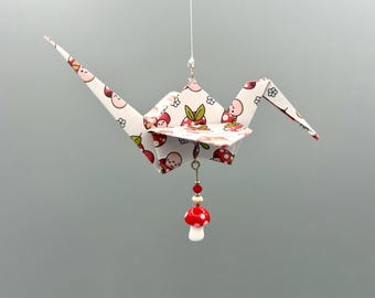 Kawaii origami kraanvogelornament met paddenstoelen