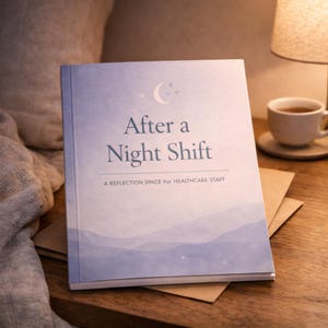 May include: A book titled "After a Night Shift" with a blue and white cover, resting on a wooden surface. The book's cover features a crescent moon and stars. A cup of tea and a lamp are in the background.