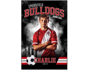 May include: A digital banner template for Adobe Photoshop featuring a soccer player in a red and white jersey with a soccer ball. The banner is black with white smoke effects and the text "SPRINGFIELD BULLDOGS SENIOR 2024" and "CHARLIE SMITH".