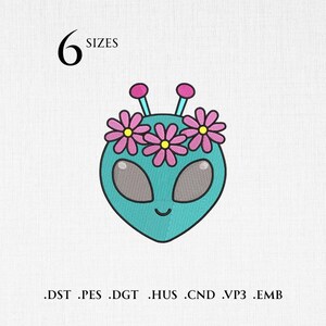 May include: A teal alien head with large oval eyes and a small smile, wearing a flower crown. The image includes the text "6 Sizes" and file type extensions .DST .PES .DGT .HUS .CND .VP3 .EMB.