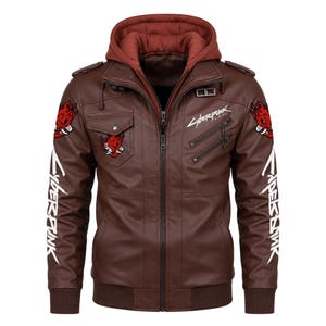 May include: A brown faux leather jacket featuring a dark red hood, a front zipper closure, and two diagonal chest pockets. The jacket displays white Cyberpunk text on the chest and sleeves, along with red and white oni mask patches on the shoulders.